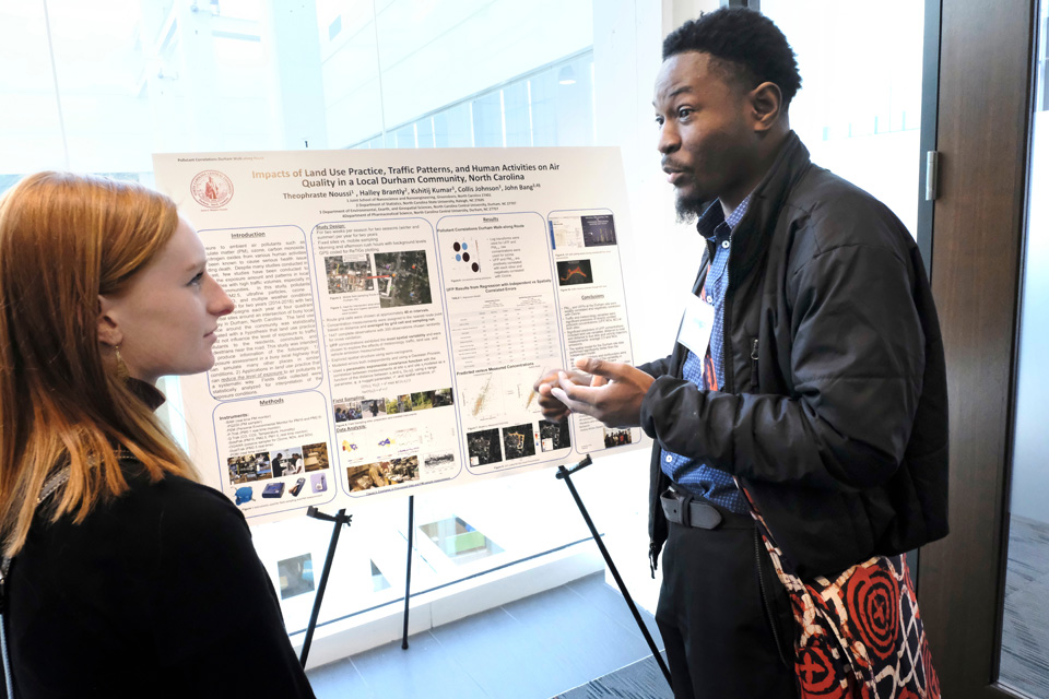 student sharing poster